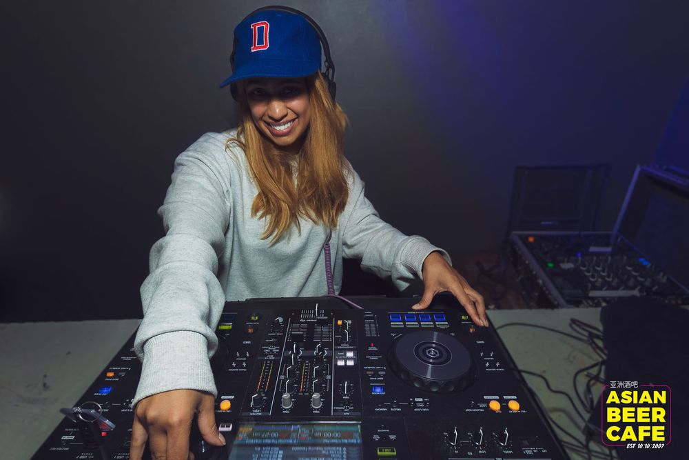 A resident DJ on the decks at Asian Beer Cafe